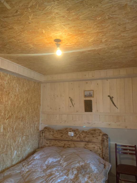 Postel nebo postele na pokoji v ubytování Guesthouse Aprasidze