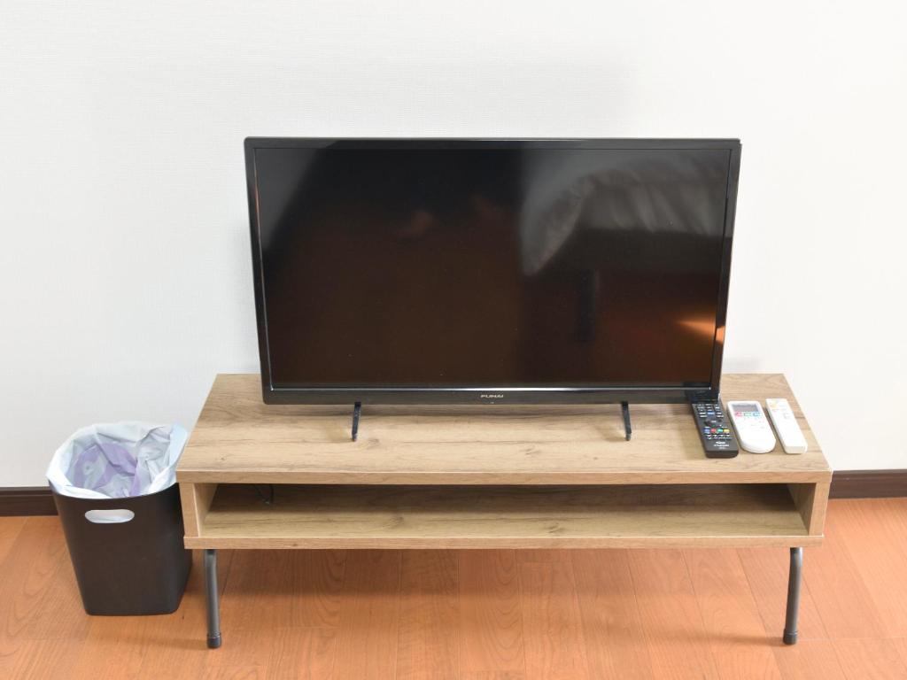 TV a/nebo společenská místnost v ubytování Anchor
