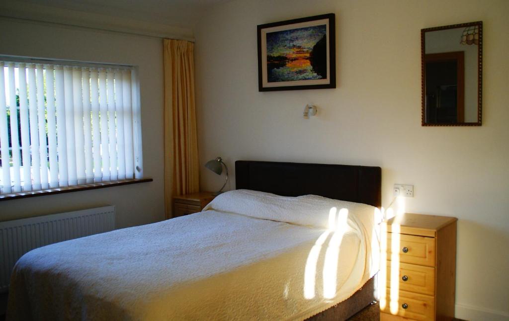 Postel nebo postele na pokoji v ubytování Rockville House B&B