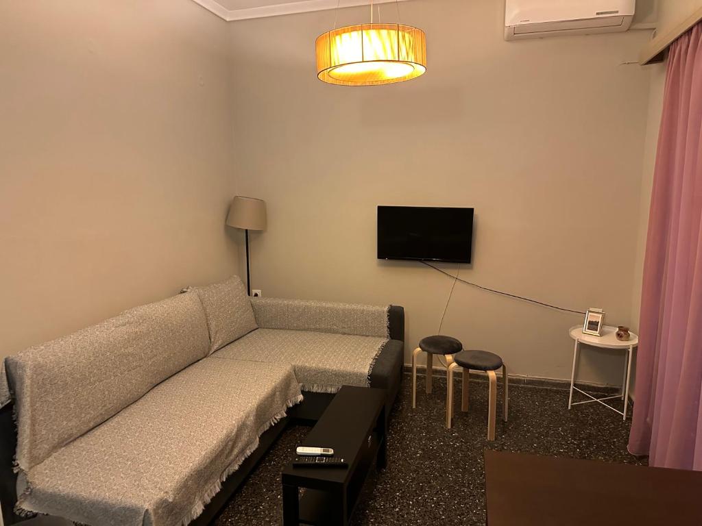 TV a/nebo společenská místnost v ubytování Serenity Apartment