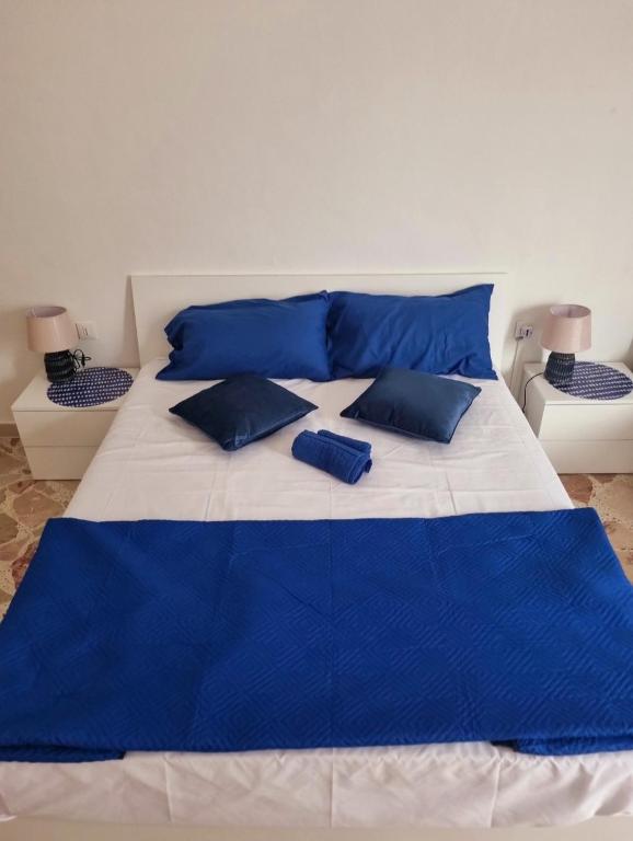 Postel nebo postele na pokoji v ubytování Onda blu