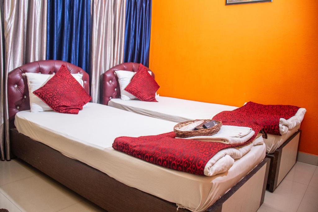 Postel nebo postele na pokoji v ubytování Babul Hotel