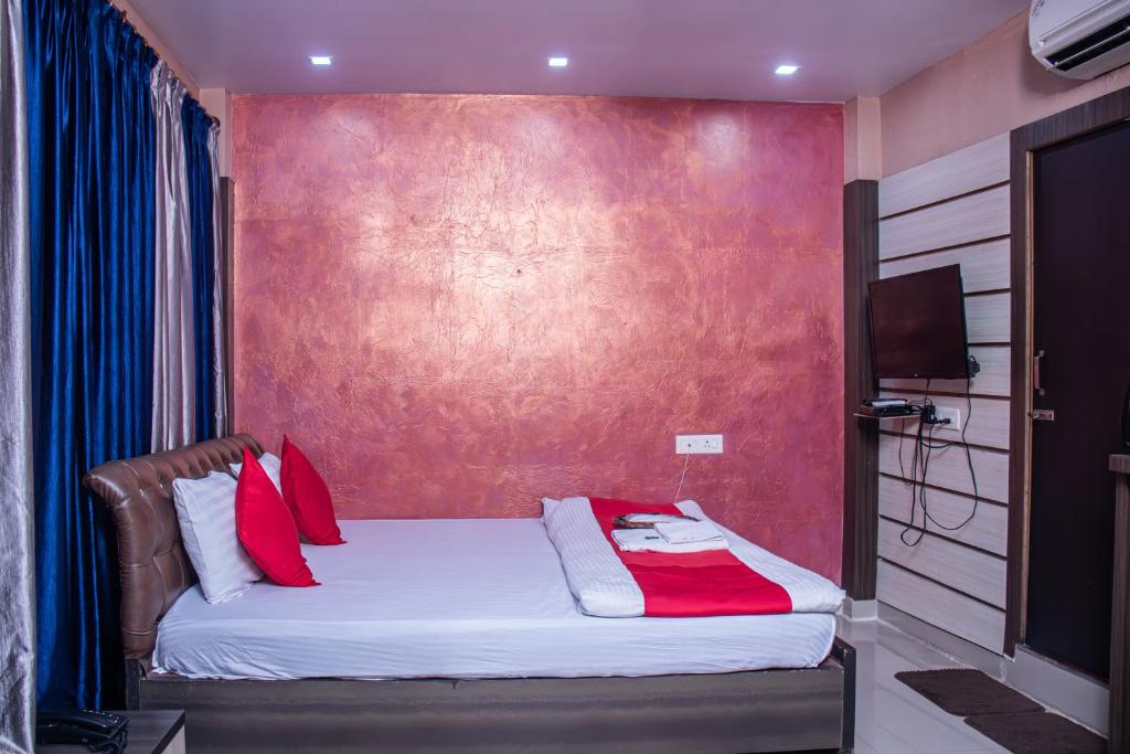 Postel nebo postele na pokoji v ubytování Babul Hotel