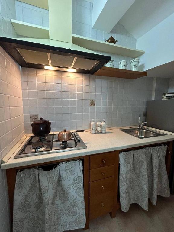Kuchyň nebo kuchyňský kout v ubytování B&B Lilium Otranto