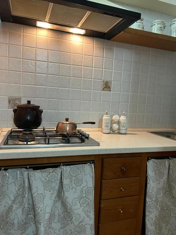 Kuchyň nebo kuchyňský kout v ubytování B&B Lilium Otranto