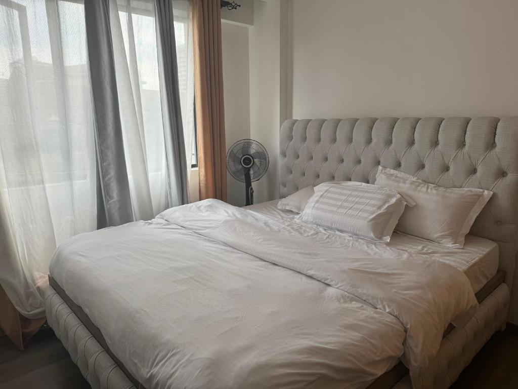 En eller flere senge i et værelse på Greenes property