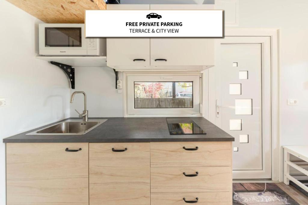 Kuchyň nebo kuchyňský kout v ubytování Tiny House Ljubljana