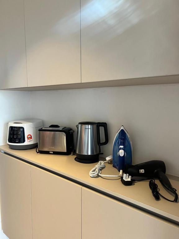 Kuchyň nebo kuchyňský kout v ubytování SS Staycation 2 Roxy Sematan Beach Apt