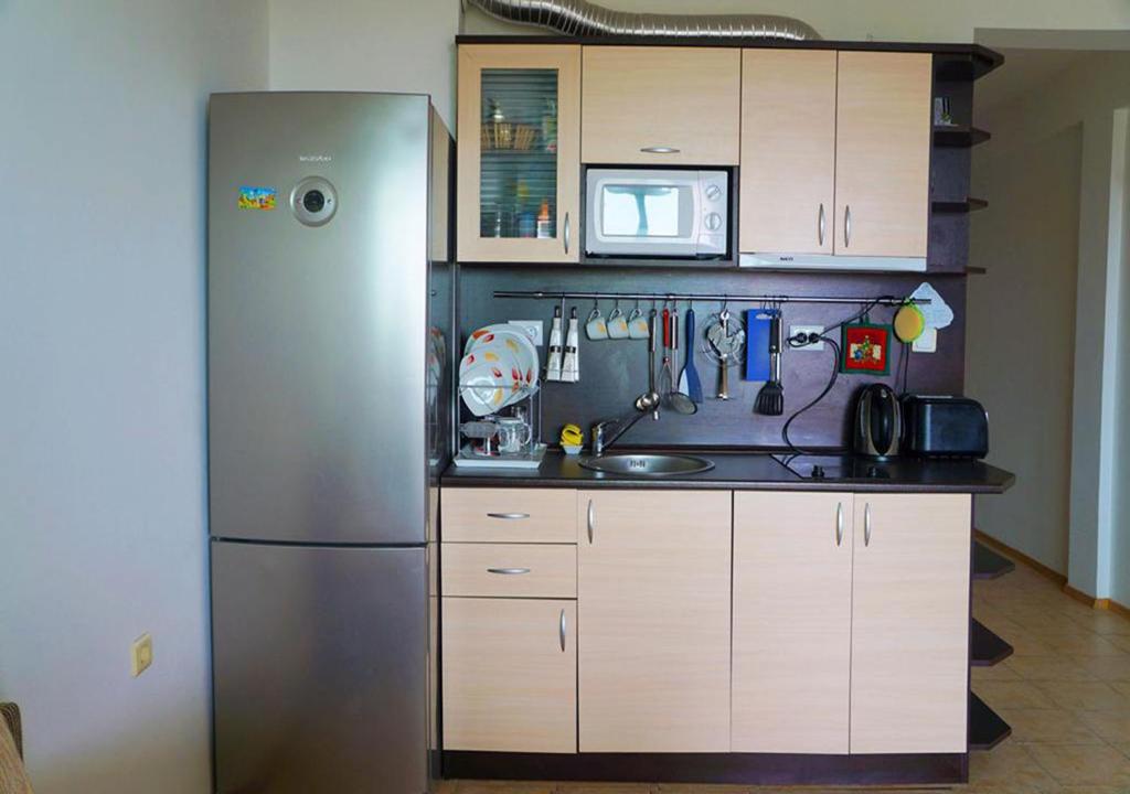 Kuchyň nebo kuchyňský kout v ubytování Dom-El Real Apartments in Sea View Complex