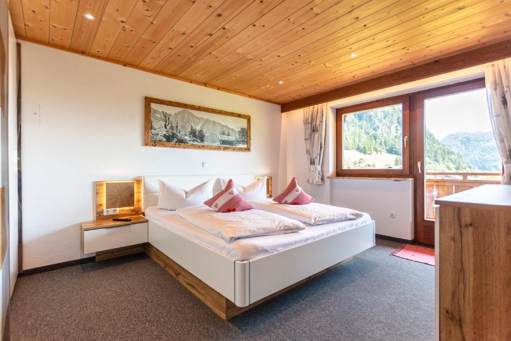 Postel nebo postele na pokoji v ubytování Mittermooshof