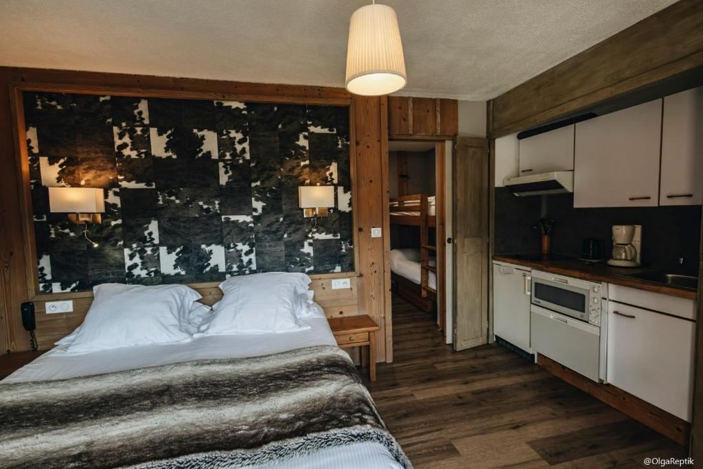 Kuchyň nebo kuchyňský kout v ubytování Logis Hotel Gai Soleil