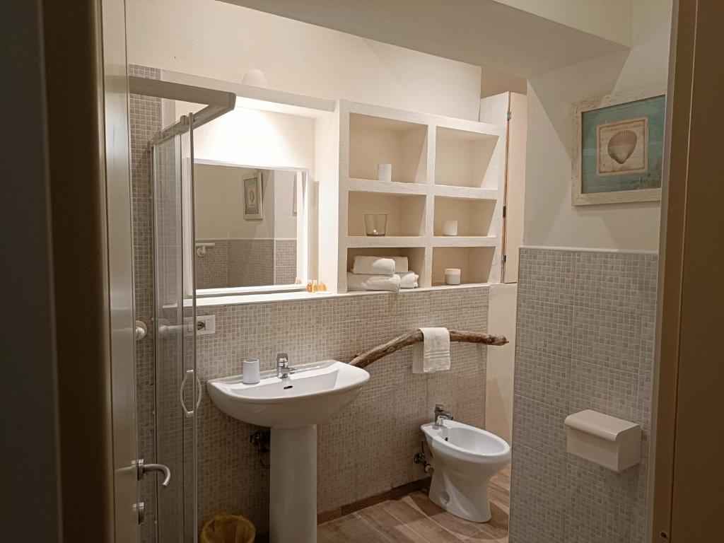 Koupelna v ubytování Gian Paul Hotel