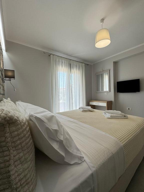 Łóżko lub łóżka w pokoju w obiekcie Iris Villas Complex