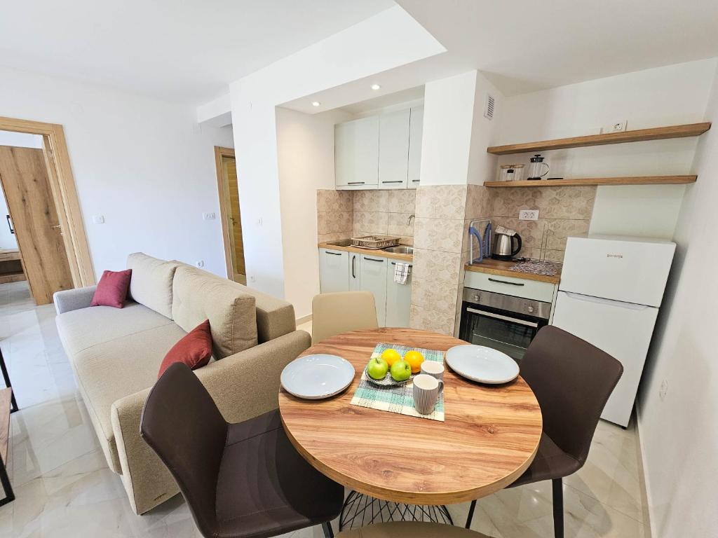 Kuchyň nebo kuchyňský kout v ubytování Harmony Garden Apartments