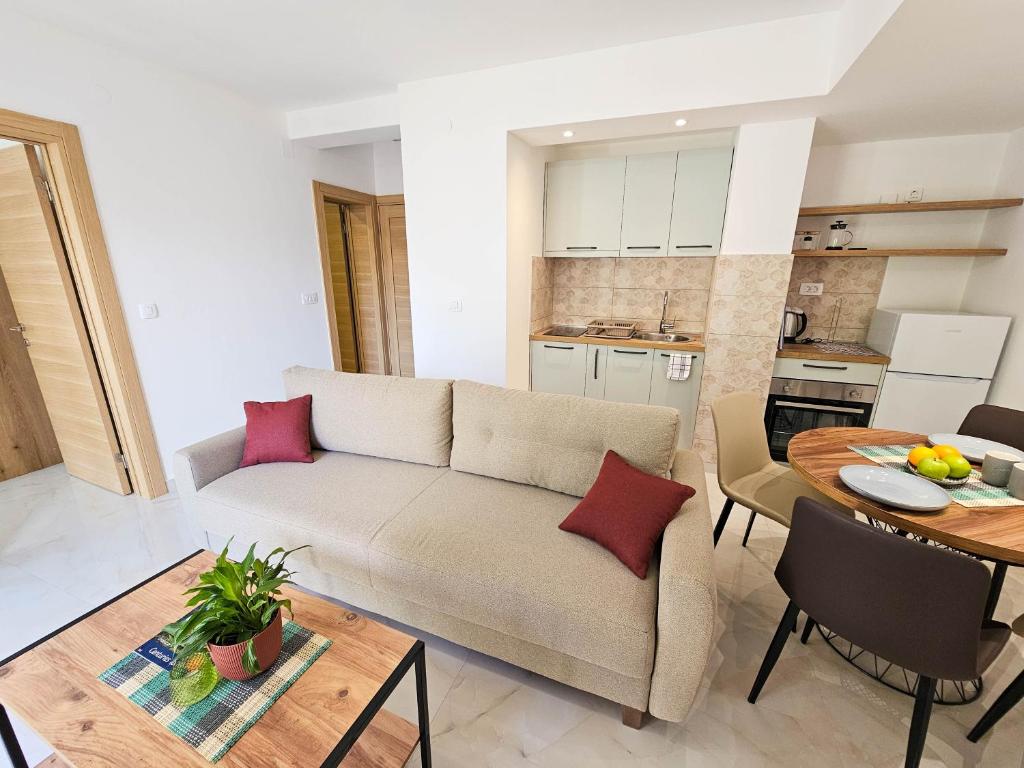 Kuchyň nebo kuchyňský kout v ubytování Harmony Garden Apartments