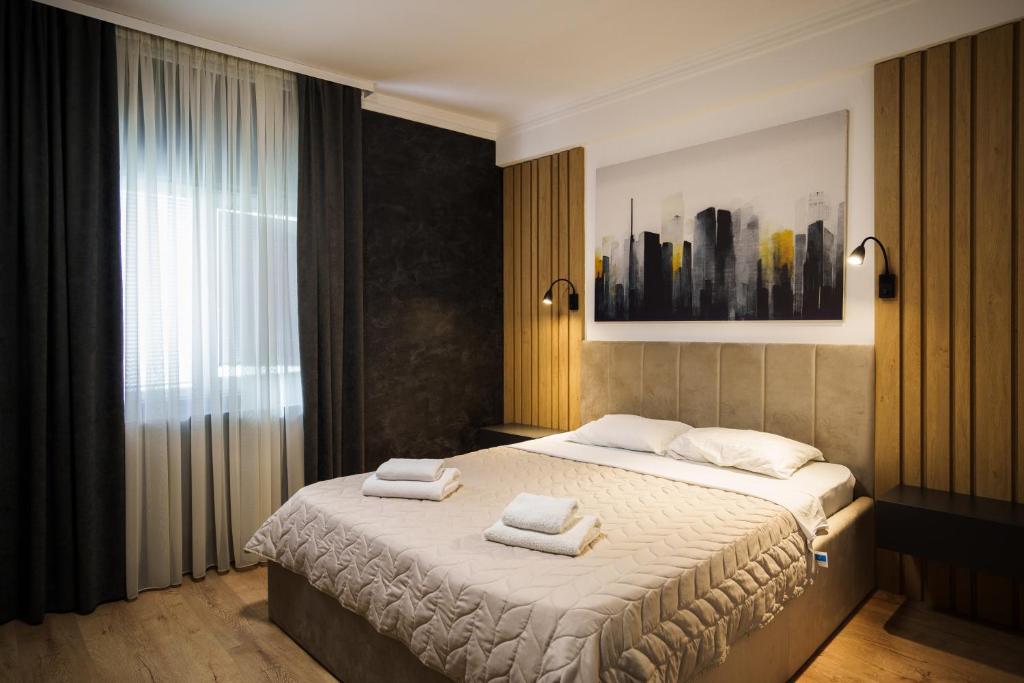 Postel nebo postele na pokoji v ubytování Hotel Zeleni Vir