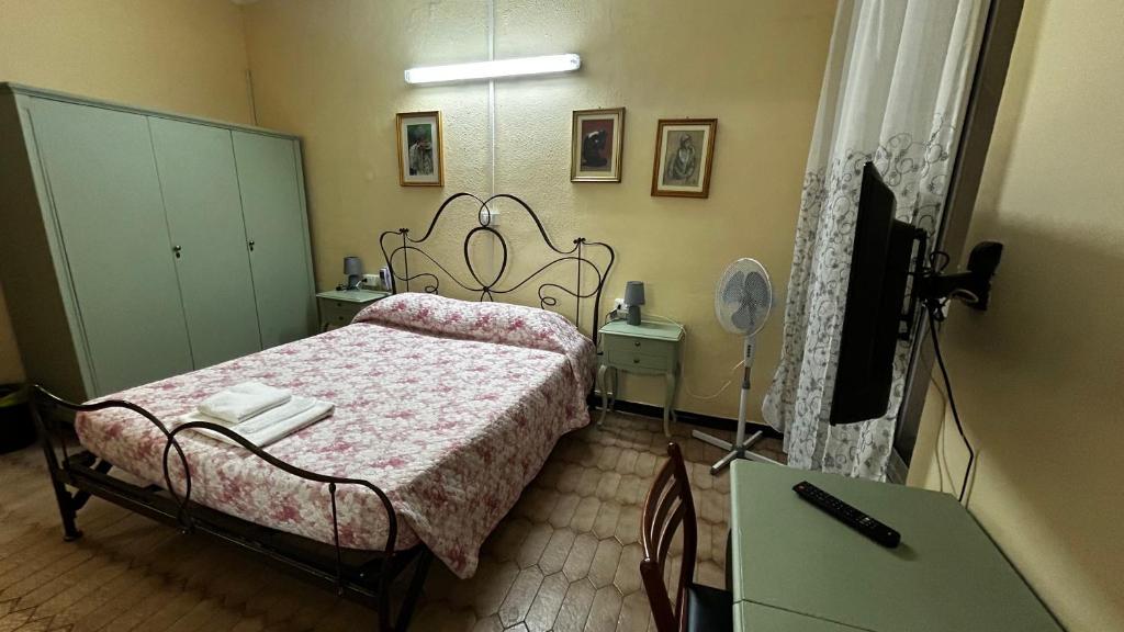 Postel nebo postele na pokoji v ubytování Albergo Fiorita