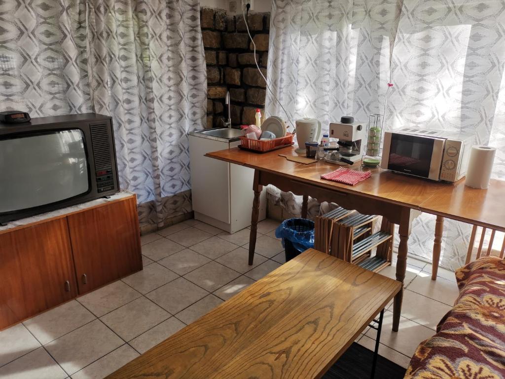 TV a/nebo společenská místnost v ubytování ZakKant-Lak