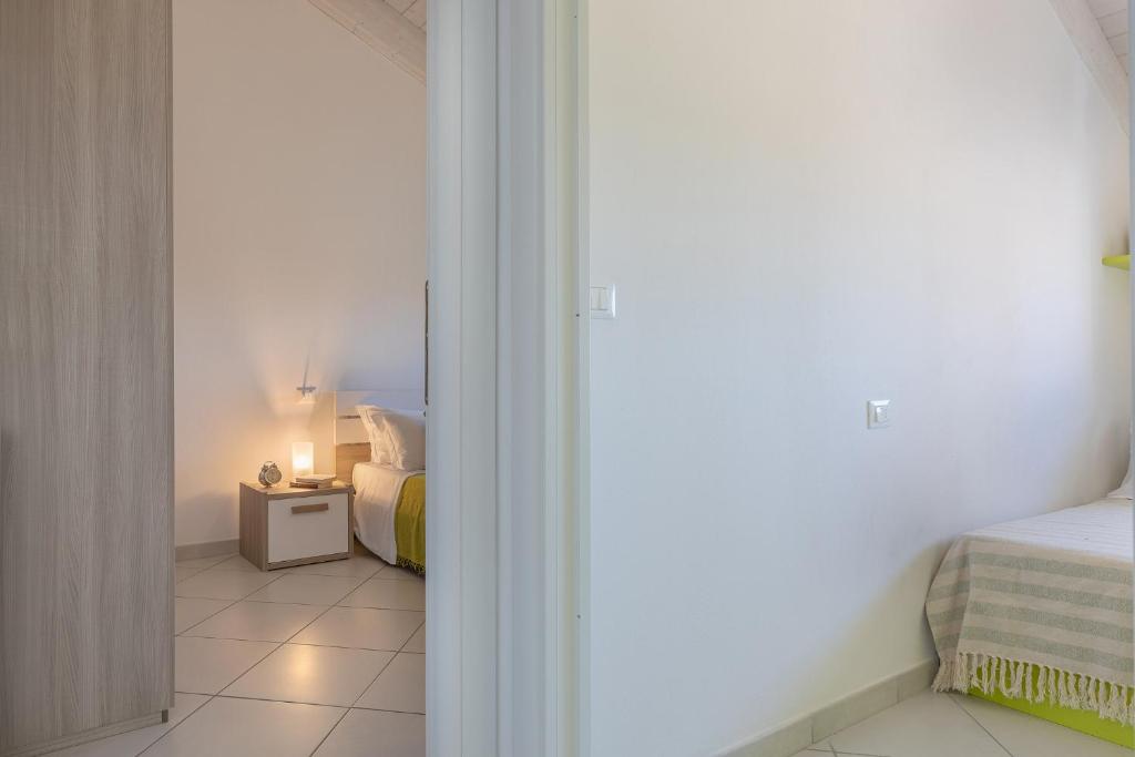 Postel nebo postele na pokoji v ubytování La Piccola Venezia Apartment