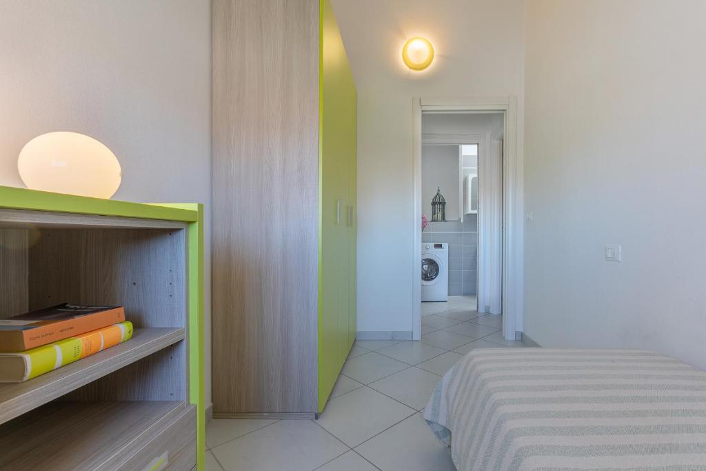Postel nebo postele na pokoji v ubytování La Piccola Venezia Apartment