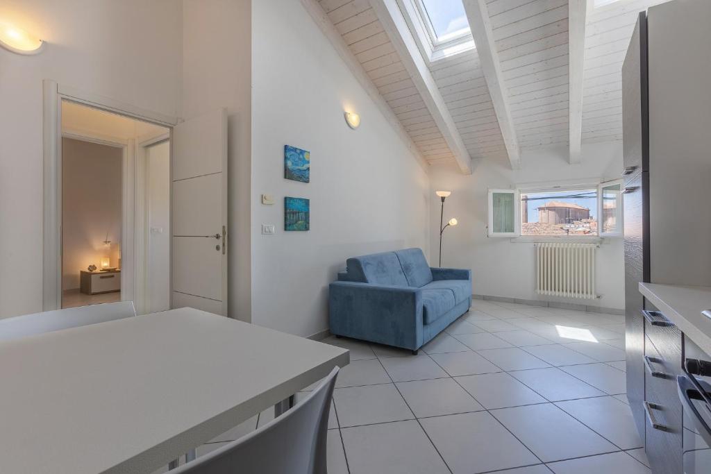 Postel nebo postele na pokoji v ubytování La Piccola Venezia Apartment