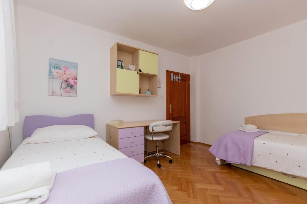 Postel nebo postele na pokoji v ubytování Villa HOPE