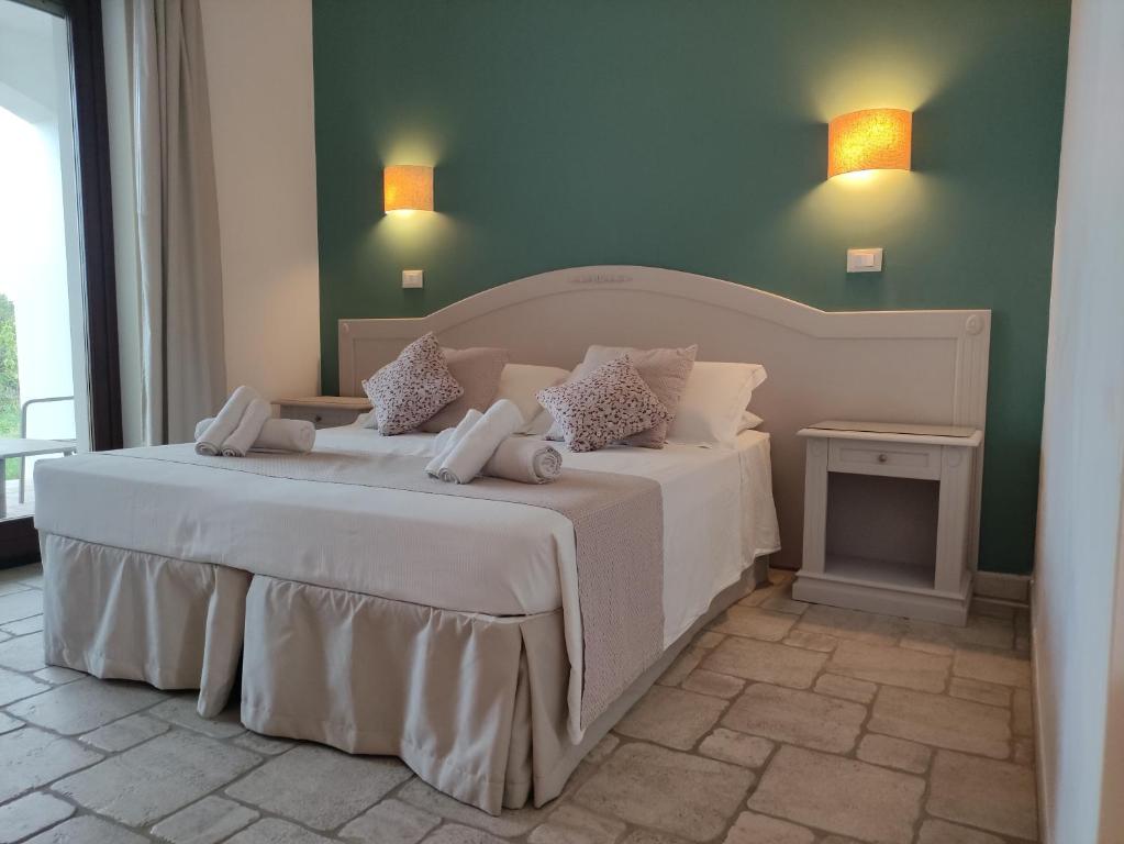 Postel nebo postele na pokoji v ubytování B&B La Vigna