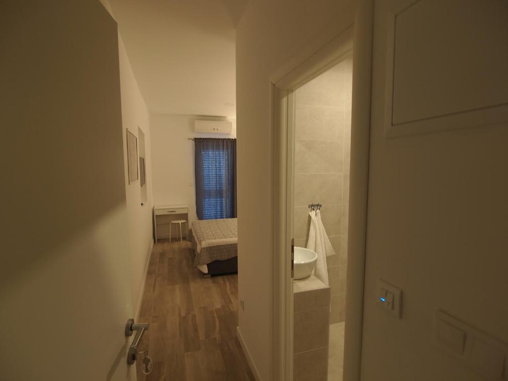 Postel nebo postele na pokoji v ubytování Rooms Bruno