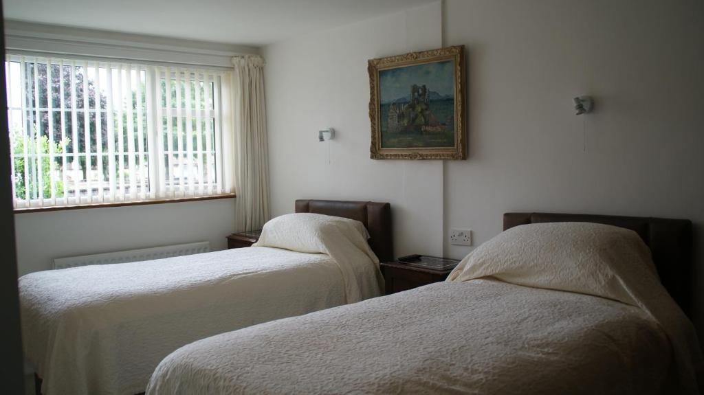 Postel nebo postele na pokoji v ubytování Rockville House B&B