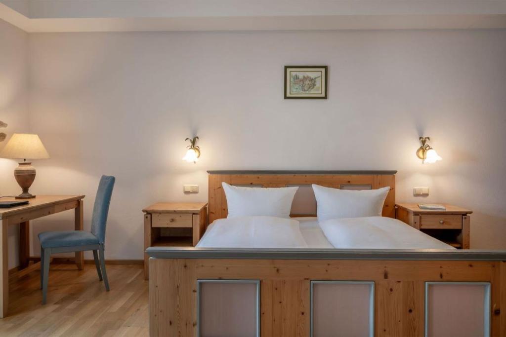 Postel nebo postele na pokoji v ubytování Landgasthof Kammbräu