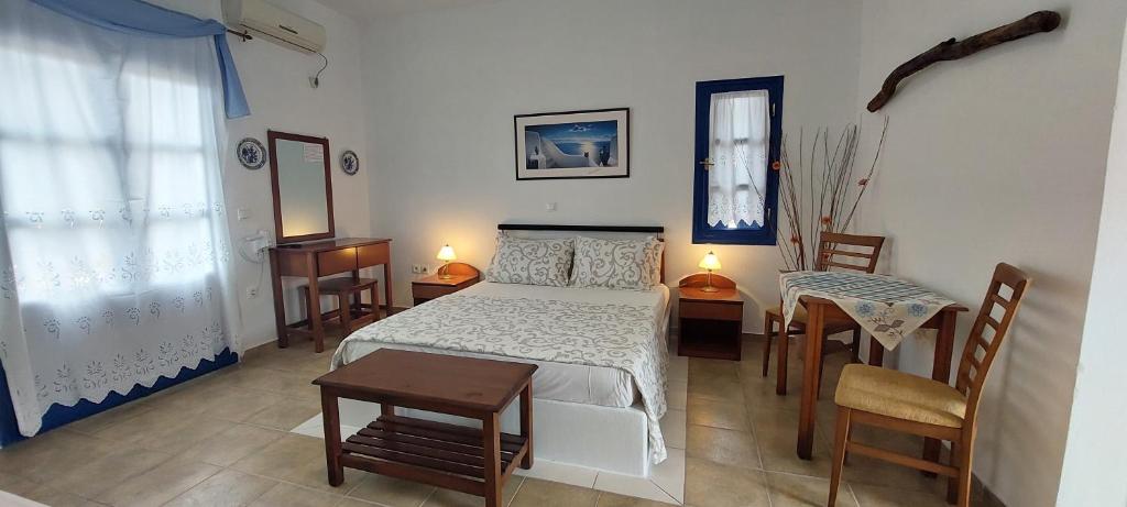 Postel nebo postele na pokoji v ubytování Aegean Star Hotel