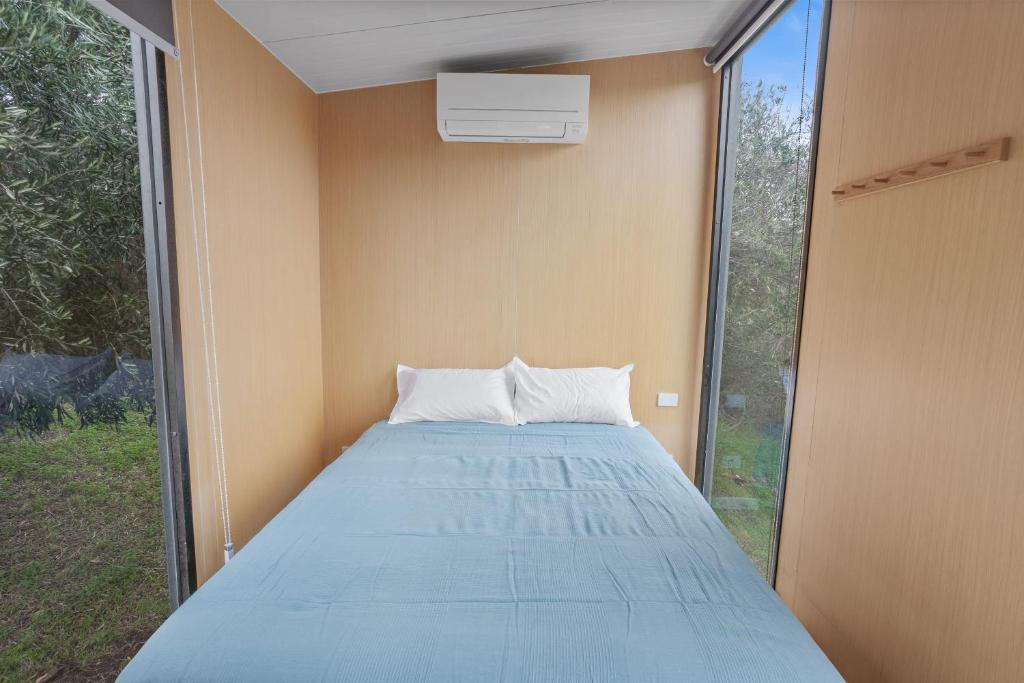 Voodi või voodid majutusasutuse Scrub Tiny House by Tiny Away toas