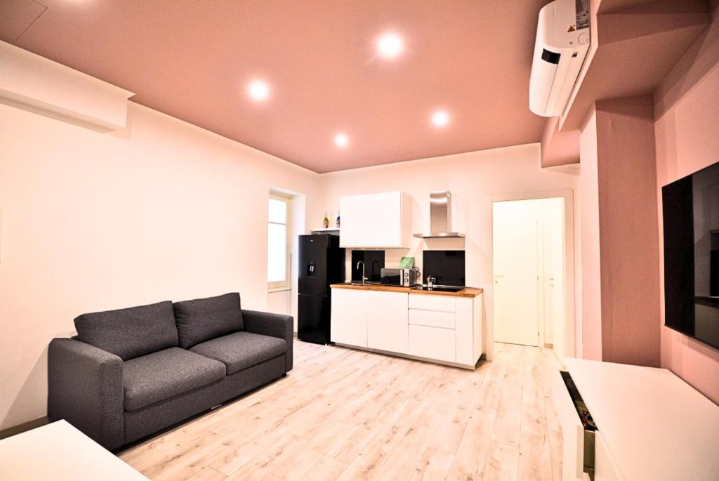 TV a/nebo společenská místnost v ubytování Tigullio Suites Rapallo