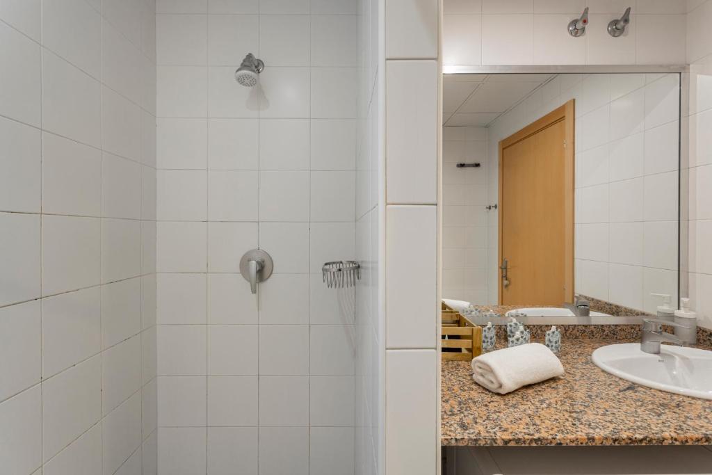 Kúpeľňa v ubytovaní Apartments Sata Olimpic Village Area