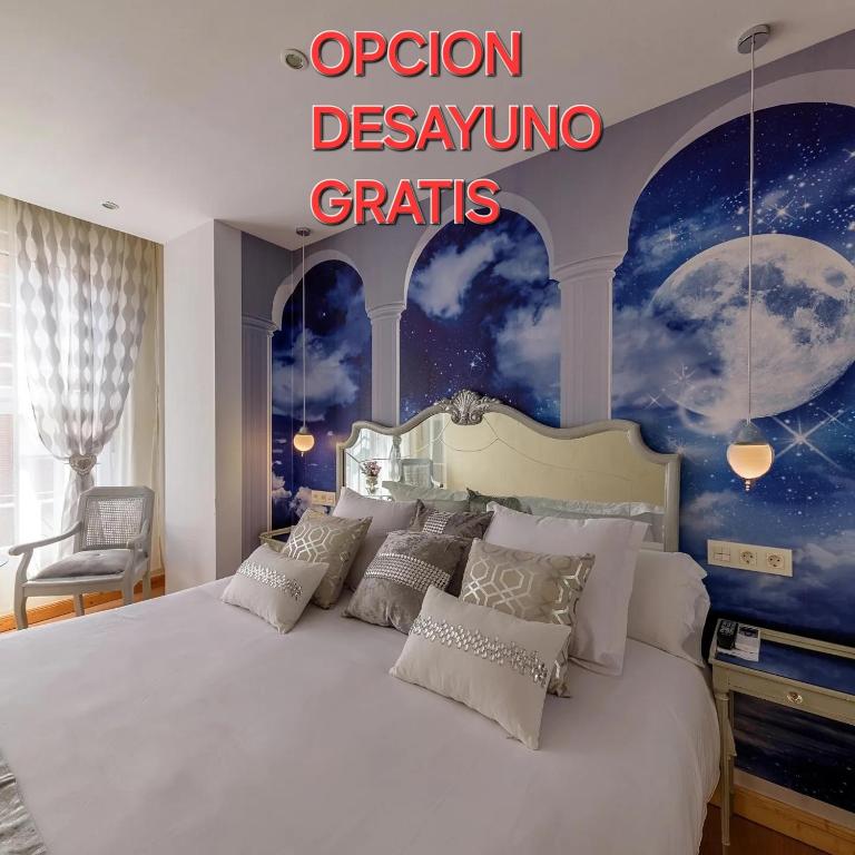 Łóżko lub łóżka w pokoju w obiekcie Hosteria Villa de Castro