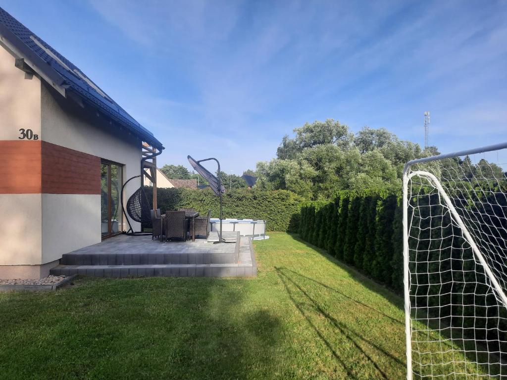 Zahrada ubytování Przy jeziorze - domek na Kaszubach
