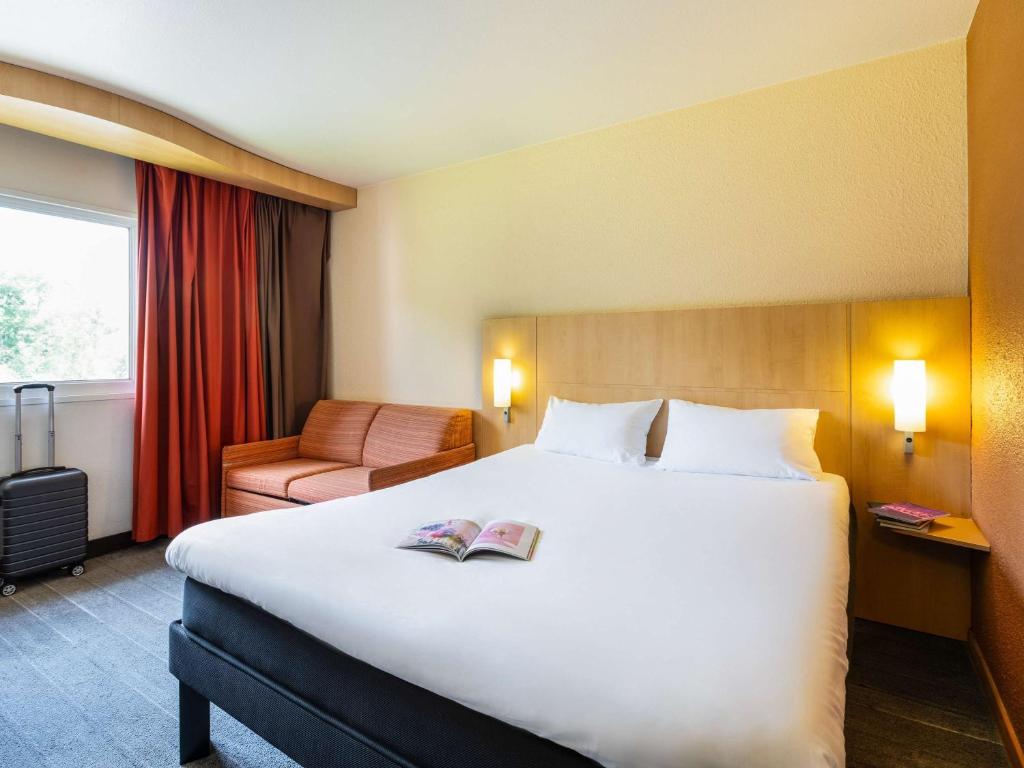 Postel nebo postele na pokoji v ubytování ibis Metz Nord