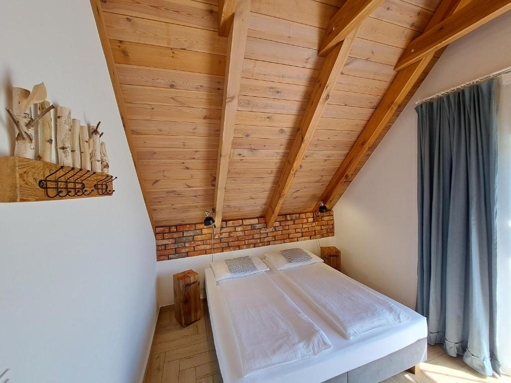 Postel nebo postele na pokoji v ubytování 4 Pokoje Swory