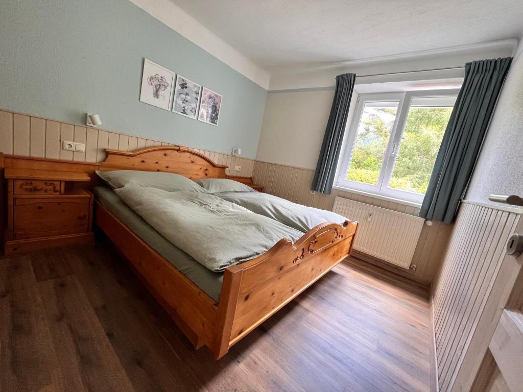 Postel nebo postele na pokoji v ubytování AH Carinthia Mallnitz - Carinthia Appartements