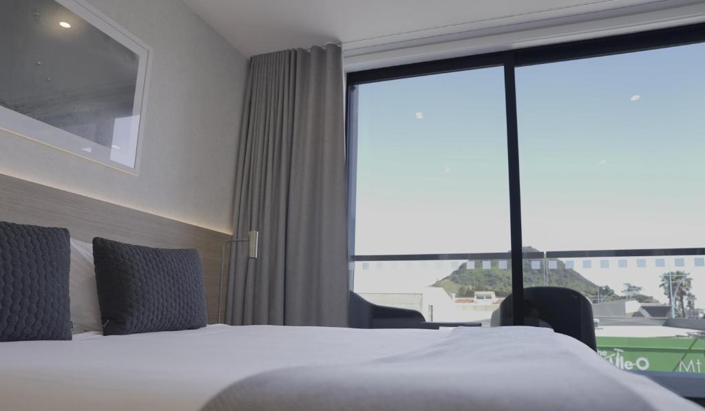 Voodi või voodid majutusasutuse Quest Mt Maunganui toas