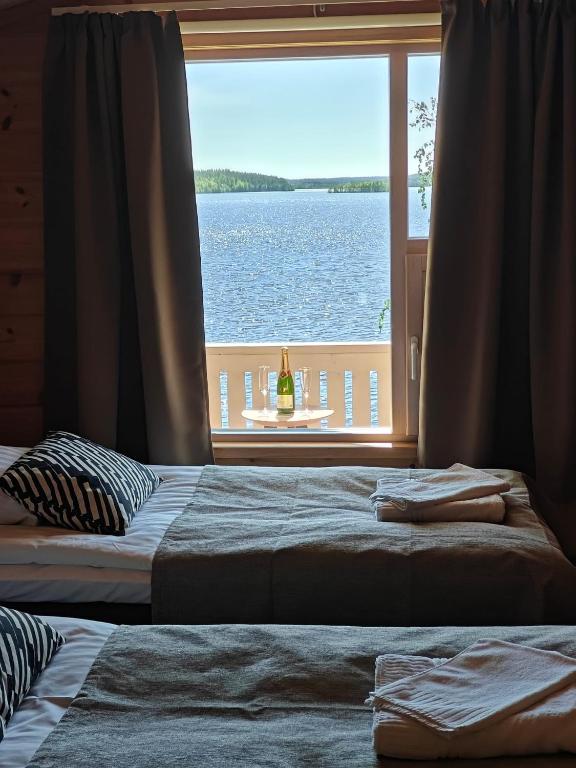 Postel nebo postele na pokoji v ubytování Jauri Resort