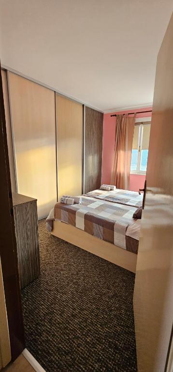 Posteľ alebo postele v izbe v ubytovaní Apartman Norma free parking