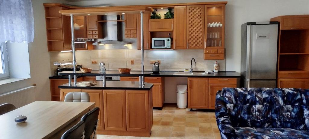 Kuchyň nebo kuchyňský kout v ubytování Apartmány pod Barunčinou školou