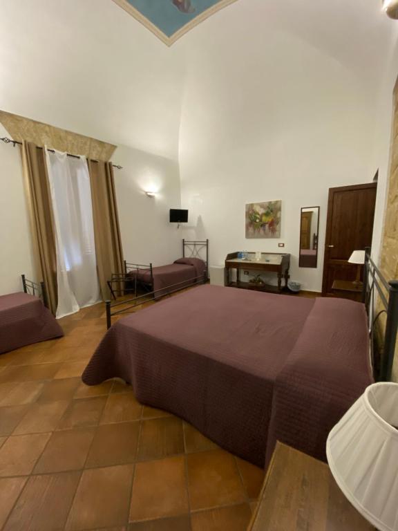 Posteľ alebo postele v izbe v ubytovaní B&B Cinisi Vacanze