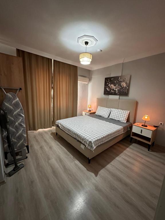Postel nebo postele na pokoji v ubytování AFŞiN HOMES