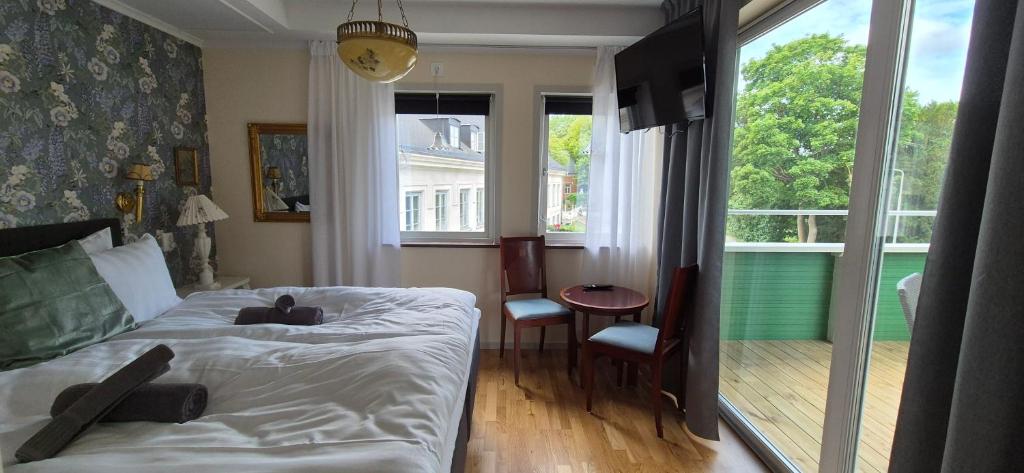 Postel nebo postele na pokoji v ubytování Slite Badhotell