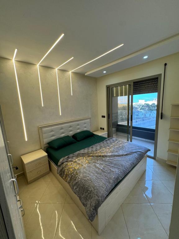 Giường trong phòng chung tại Appartement de luxe