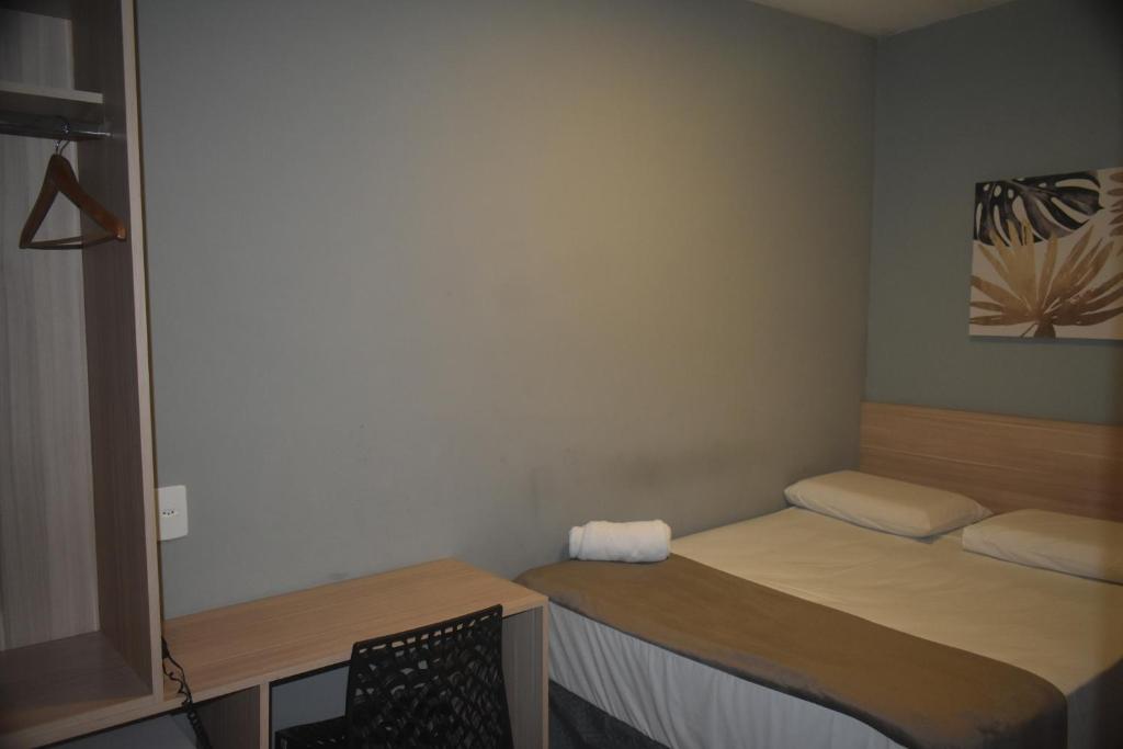 Letto o letti in una camera di Unity Hotel - Vila Mariana SP