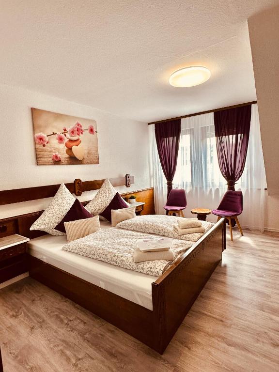 Postel nebo postele na pokoji v ubytování HAUS BENICO -Pension-