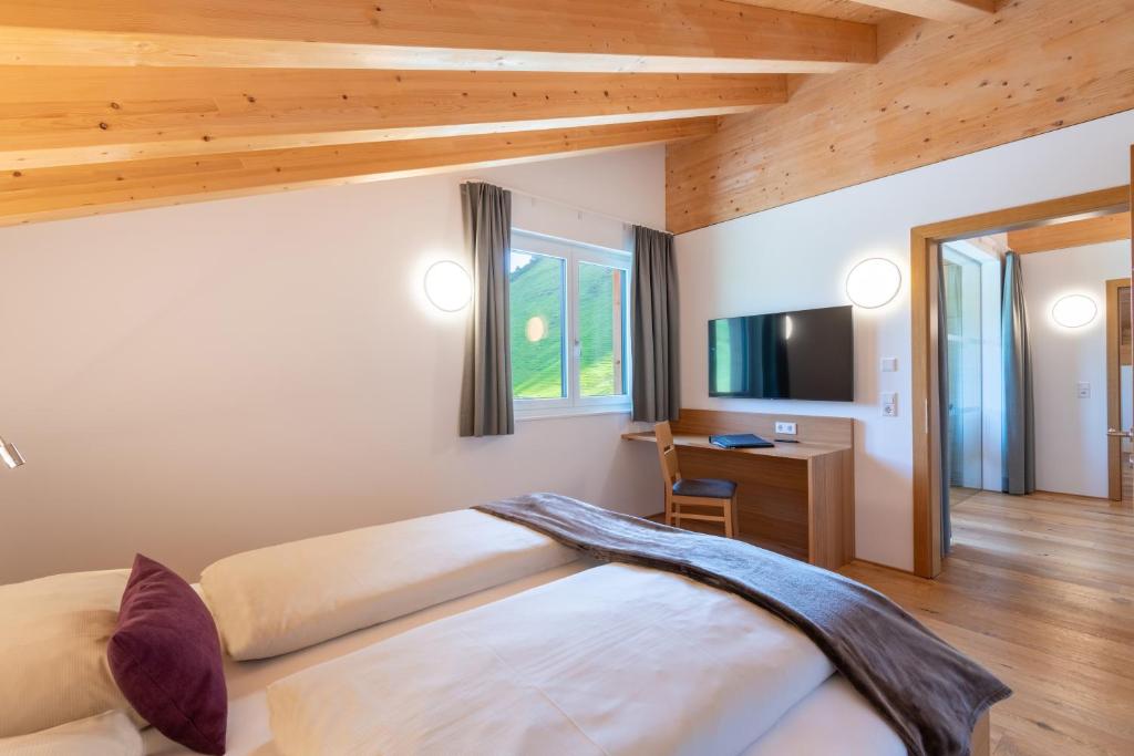TV a/nebo společenská místnost v ubytování Rössle Appartements